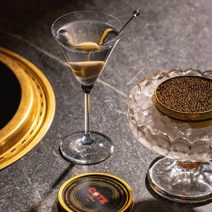 A Martini and a tin of caviar at Cote