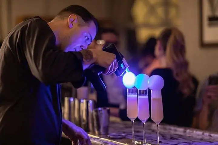 A bartender using the Flavour Blaster