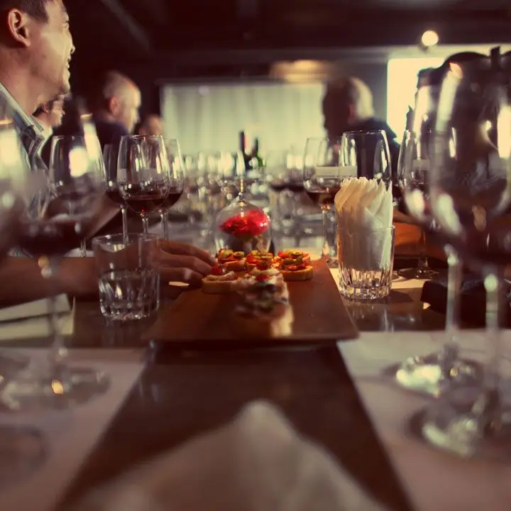 88 Lounge interior, view of table and wine glasses