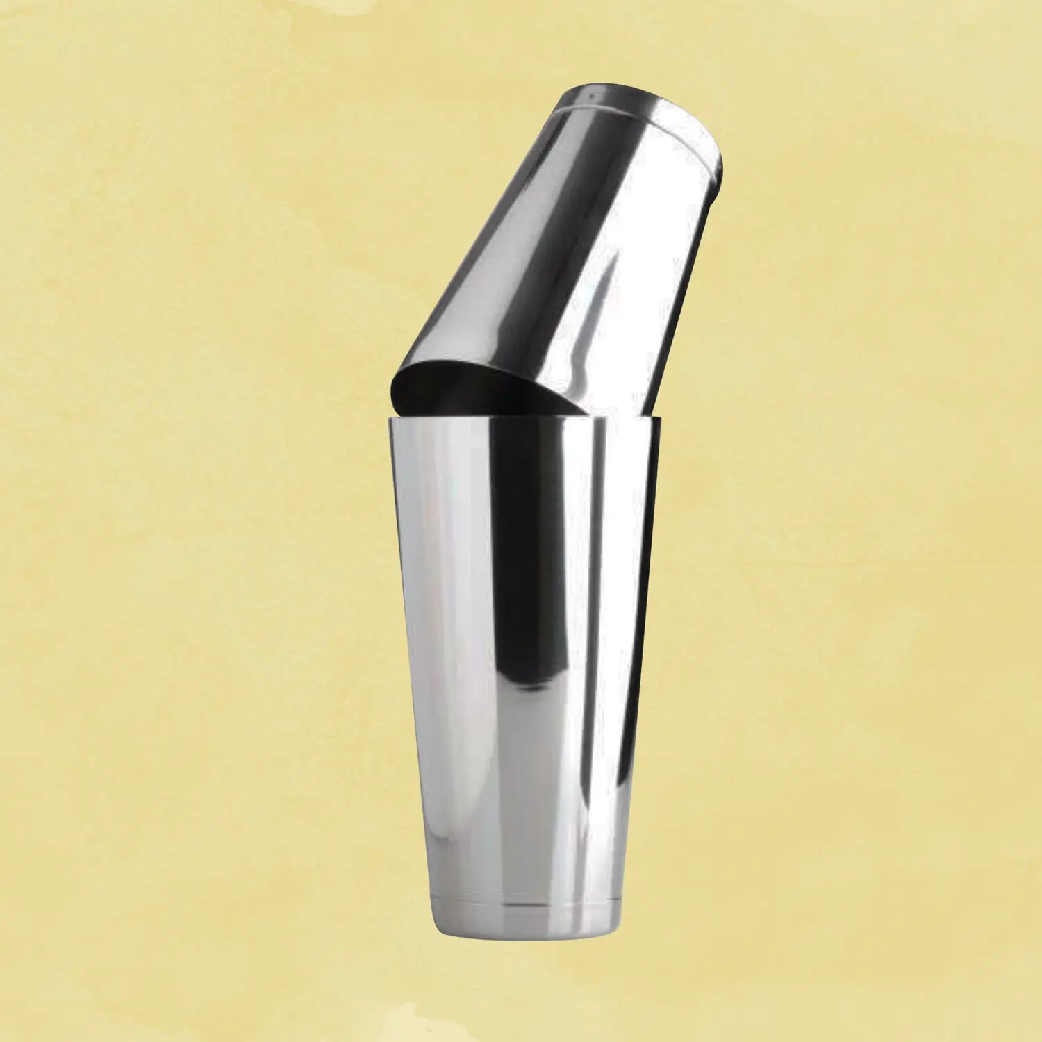 Tin-on-Tin Boston Shaker against a yellow background