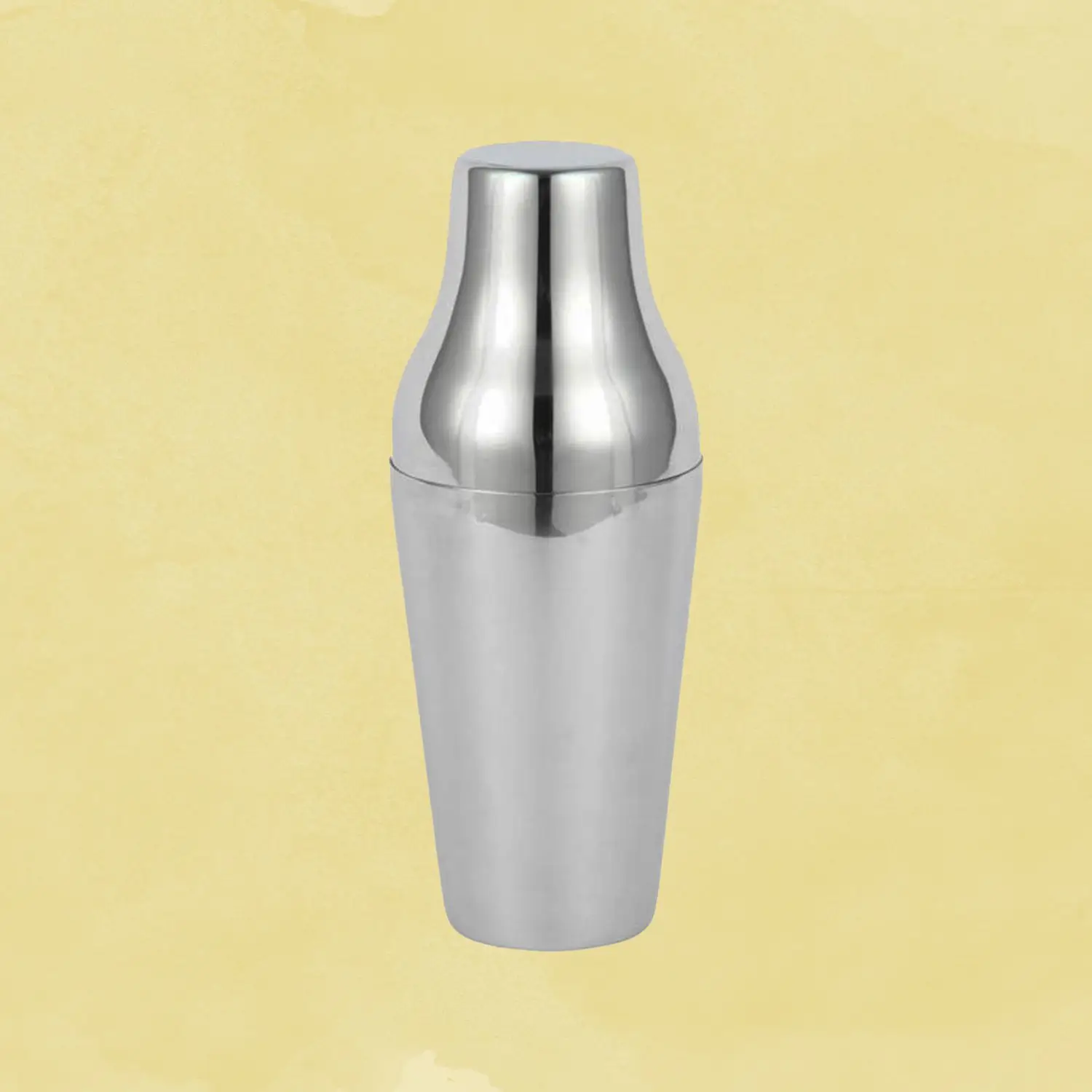 Parisian shaker against a yellow background