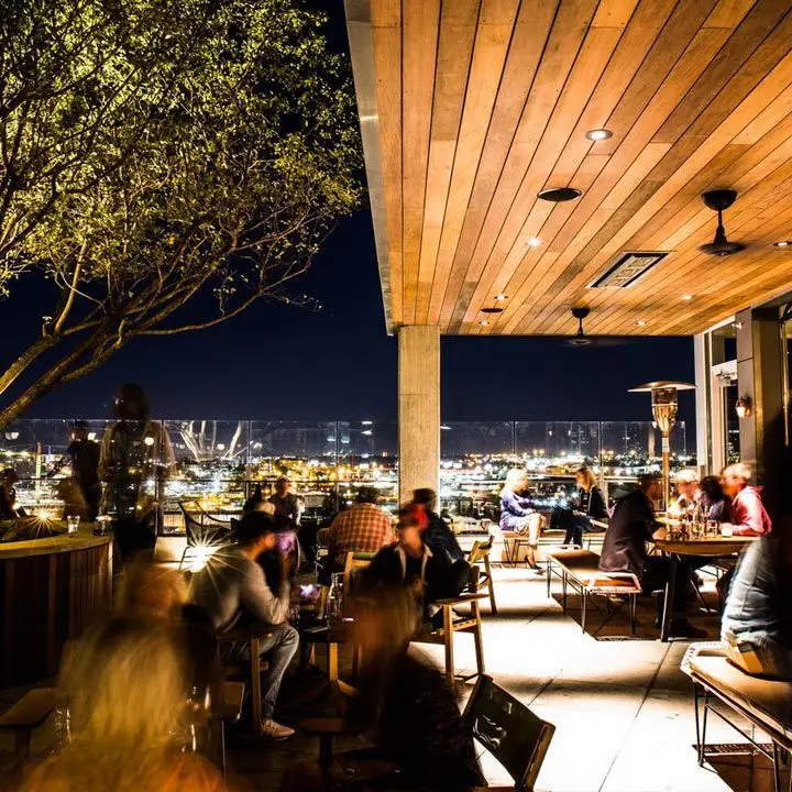 L.A. Jackson rooftop bar, with a blond wood overhang and beautiful night views of the cityscape
