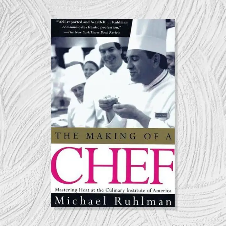 The Making of a Chef cover with a black and white photo of chefs above a gold, black, white, and magenta text block