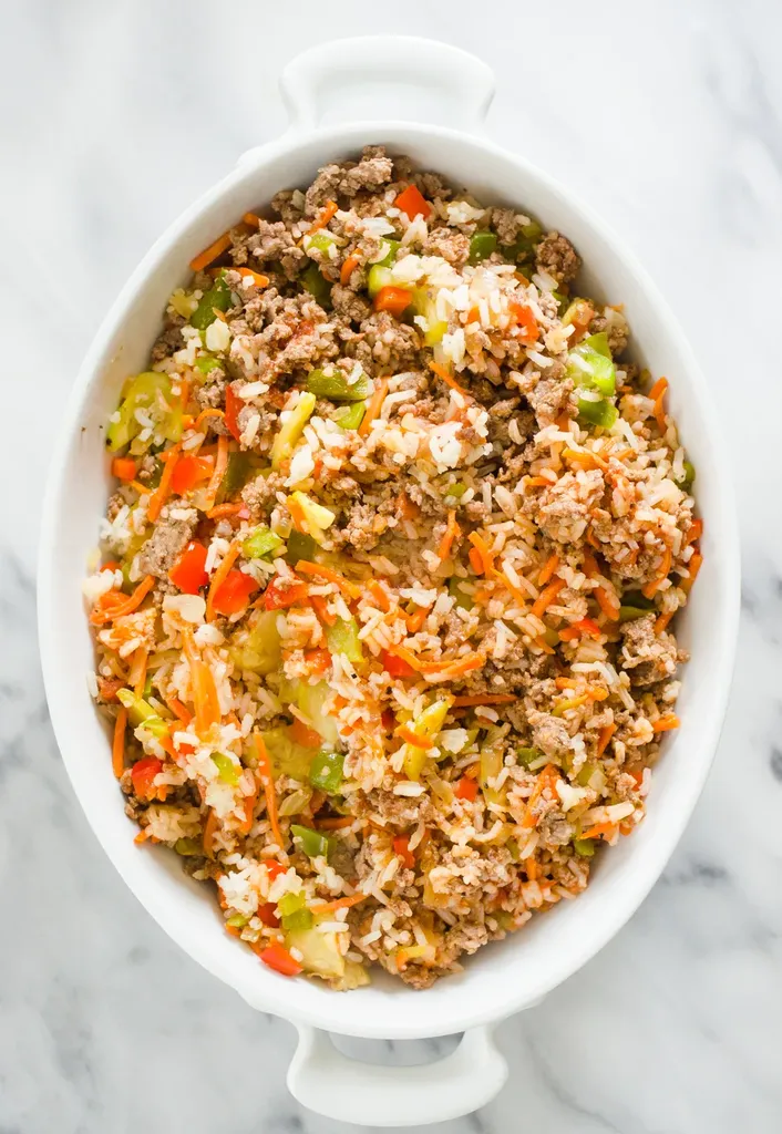 The filling part of the stuffed bell pepper casserole in a baking dish.' title='Easy Stuffed Pepper Casserole