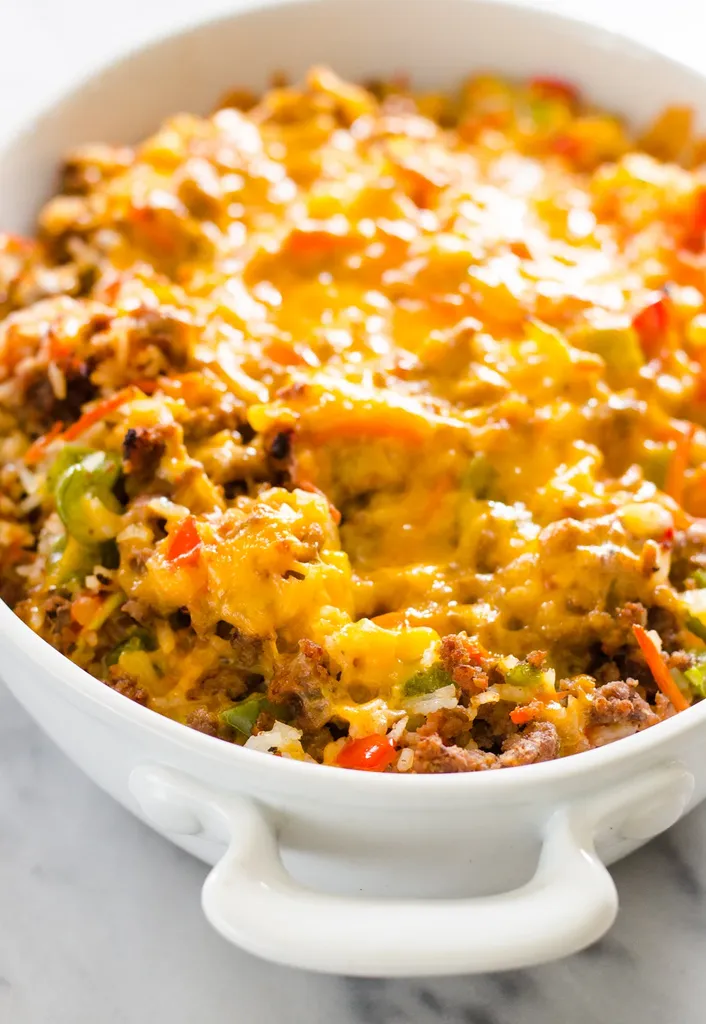 The final baked stuffed pepper casserole in a casserole dish.' title='Easy Stuffed Pepper Casserole