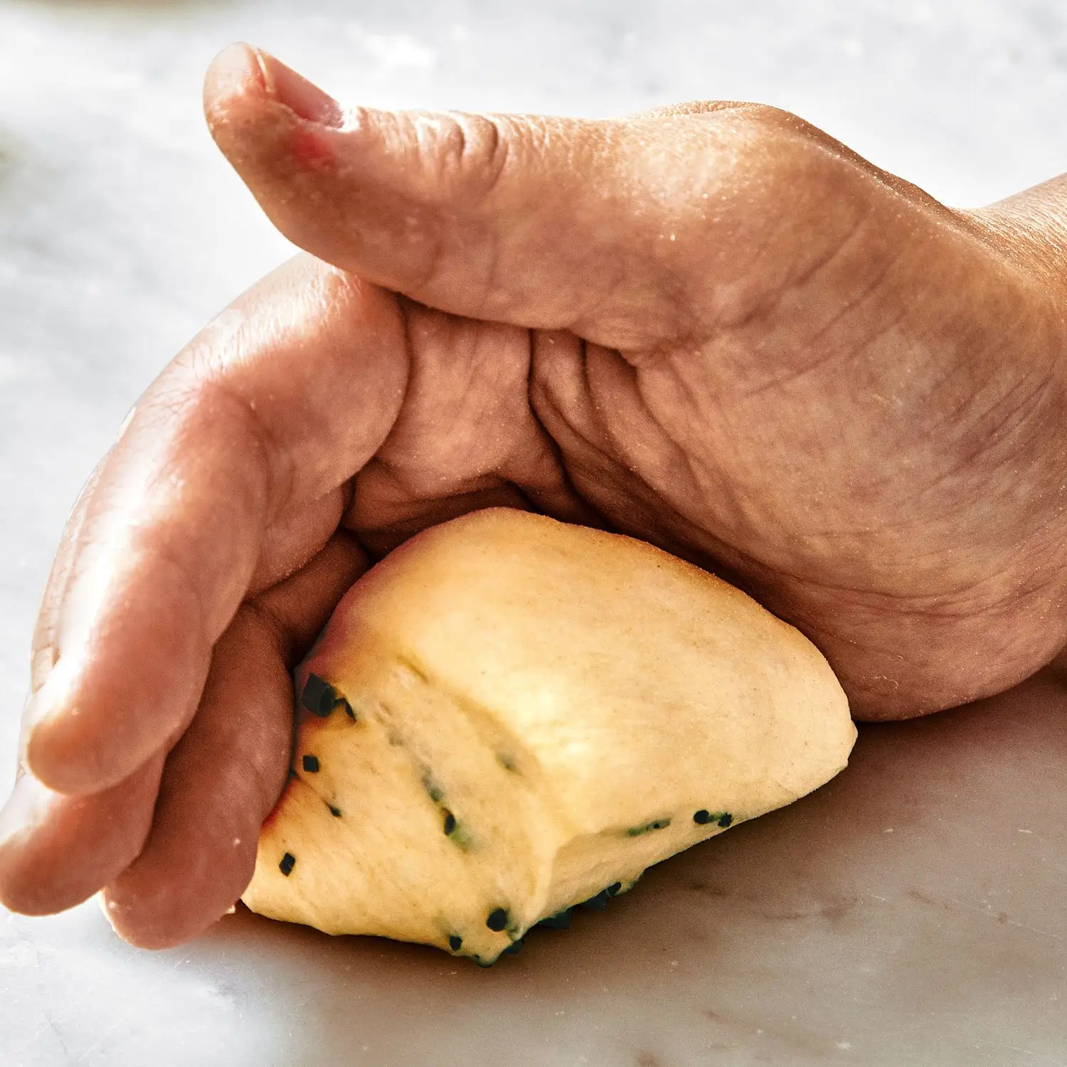 Image may contain Food Bread Human Person and Bun