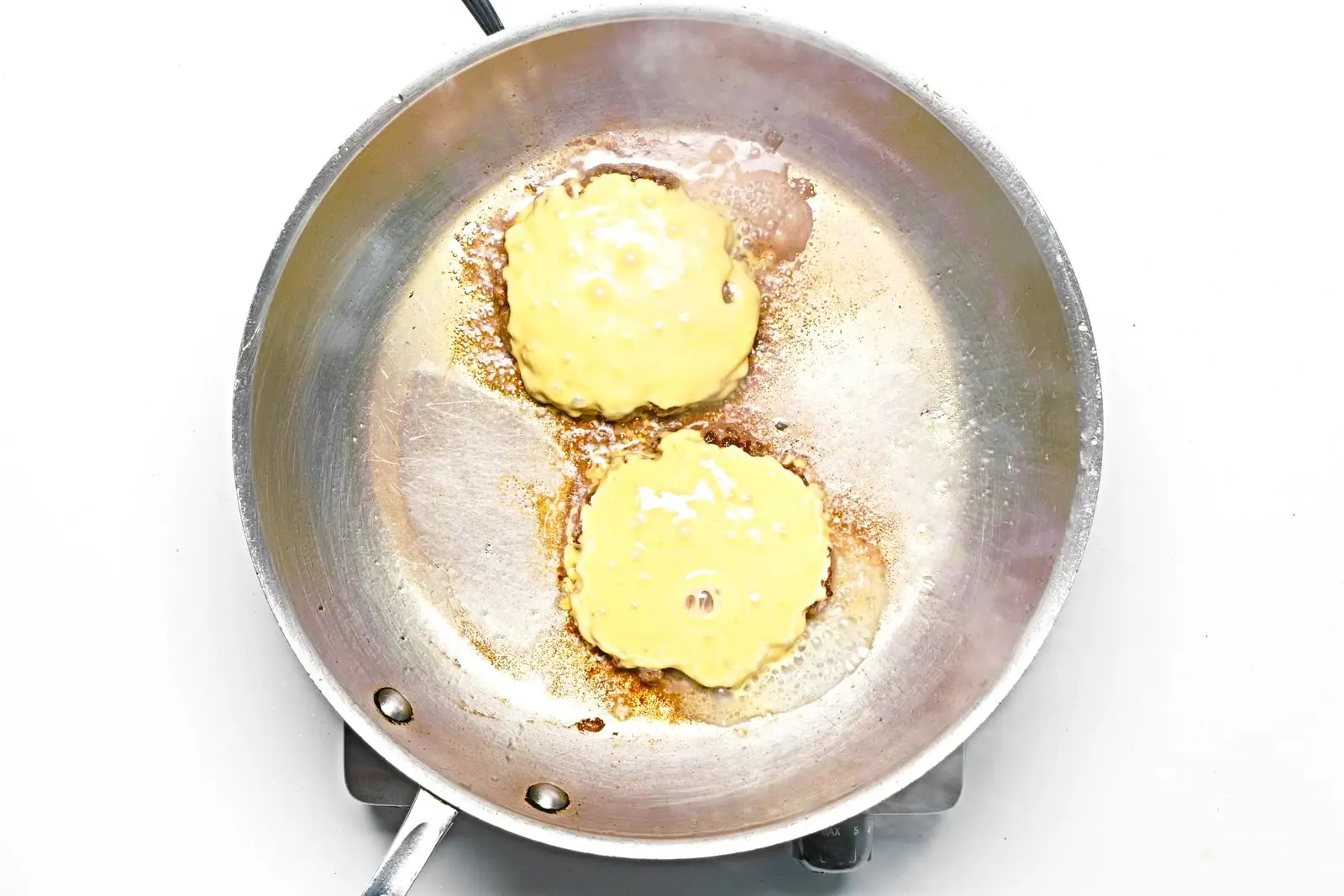 Image may contain Food Egg Wok and Frying Pan