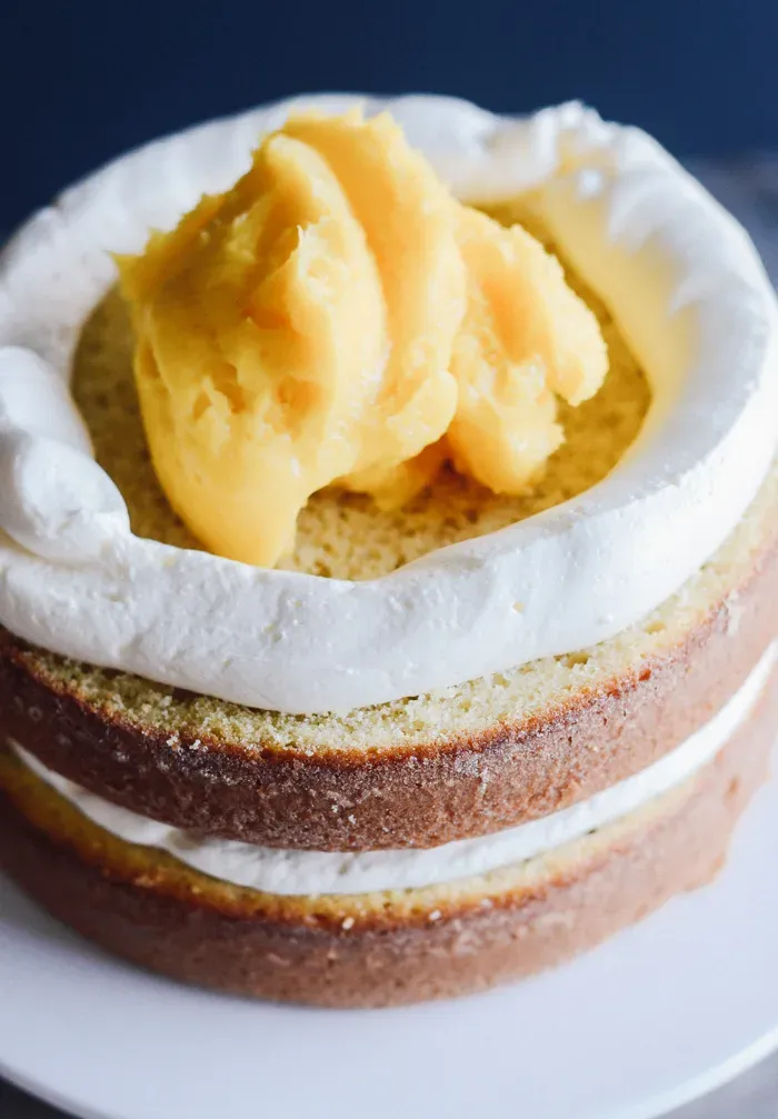 Triple Lemon Cake' title='Triple Lemon Naked Layer Cake with Edible Flowers