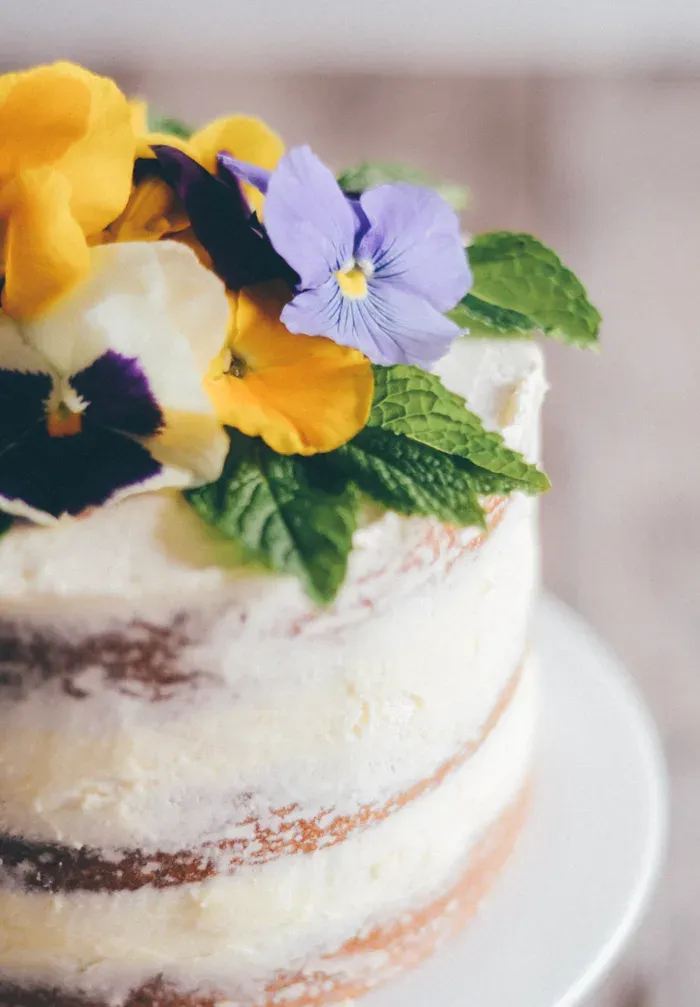 Triple Lemon Cake with Edible Flowers' title='Triple Lemon Naked Layer Cake with Edible Flowers