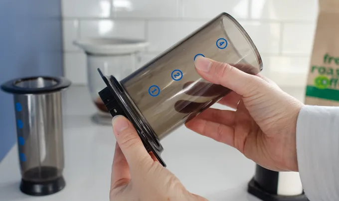 Screwing the bottom onto the aeropress.' title='Dirty Chai Latte