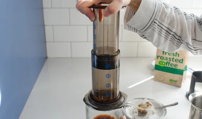 Plunging the aeropress.' title='Dirty Chai Latte