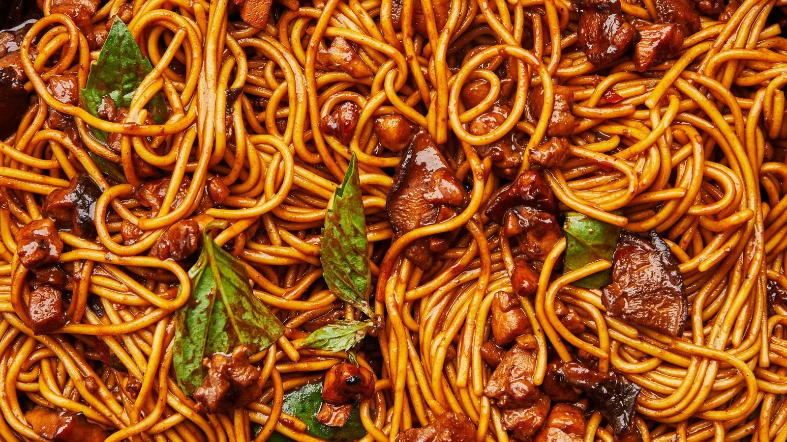 Image may contain Spaghetti Food Pasta Noodle and Food Presentation