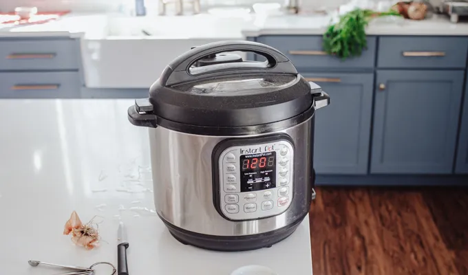 The Instant Pot set on the soup function for 120 minutes.' title='Chicken Feet Bone Broth Recipe