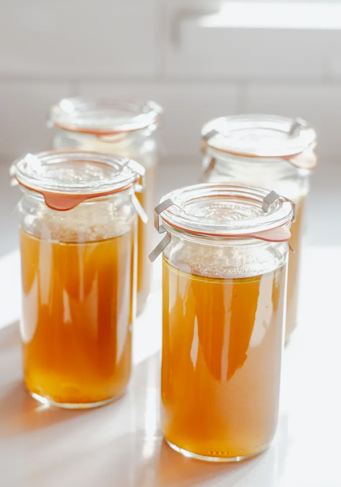 Chicken feet bone broth in Weck jars.' title='Chicken Feet Bone Broth Recipe