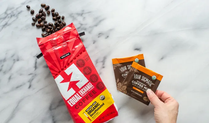 Equal Exchange and Foursigmatic coffee on a marble surface.' title='Mocha Frappuccino Recipe