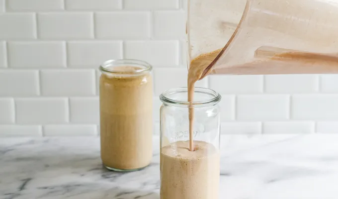 Pouring the mocha frappuccino into a cup.' title='Mocha Frappuccino Recipe