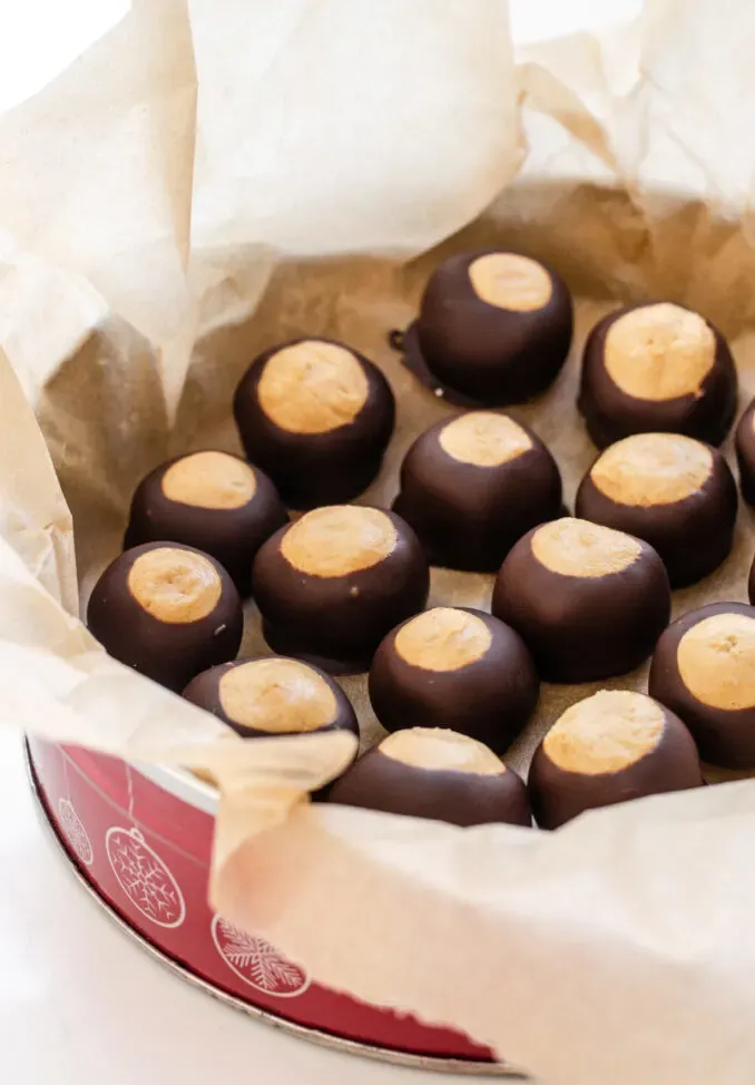 Homemade Buckeye recipe without shortening placed in a Christmas tin. ' title='Buckeye Recipe Without Shortening