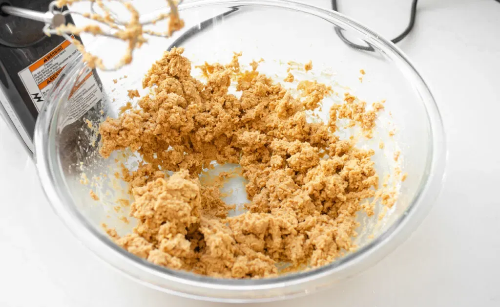 Mixing together the peanut butter butter and powdered sugar.' title='Buckeye Recipe Without Shortening