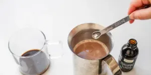 Adding the peppermint flavor to the milk/chocolate mixture.' title='Peppermint Mocha Starbucks Recipe