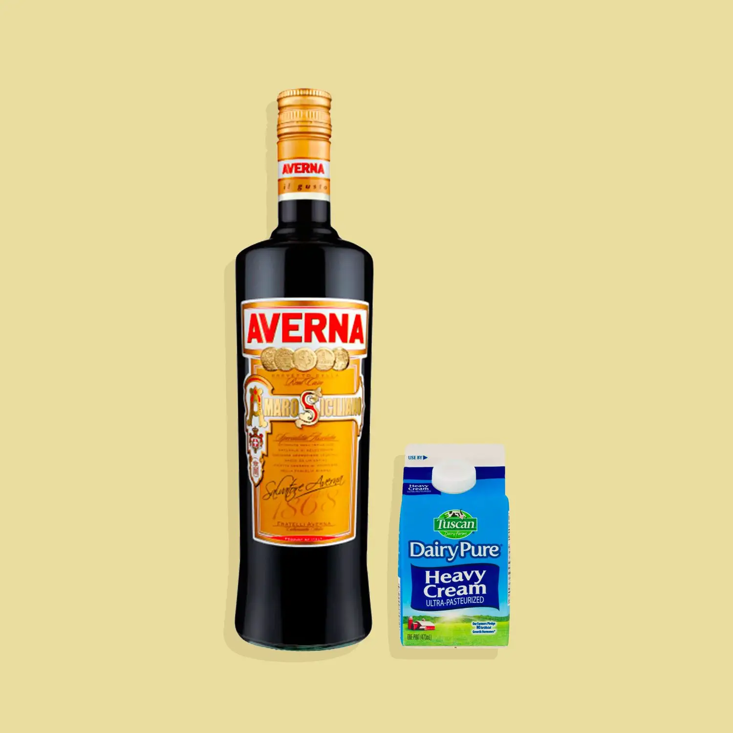 Bottle of Amaro Averna and carton of heavy cream against yellow background