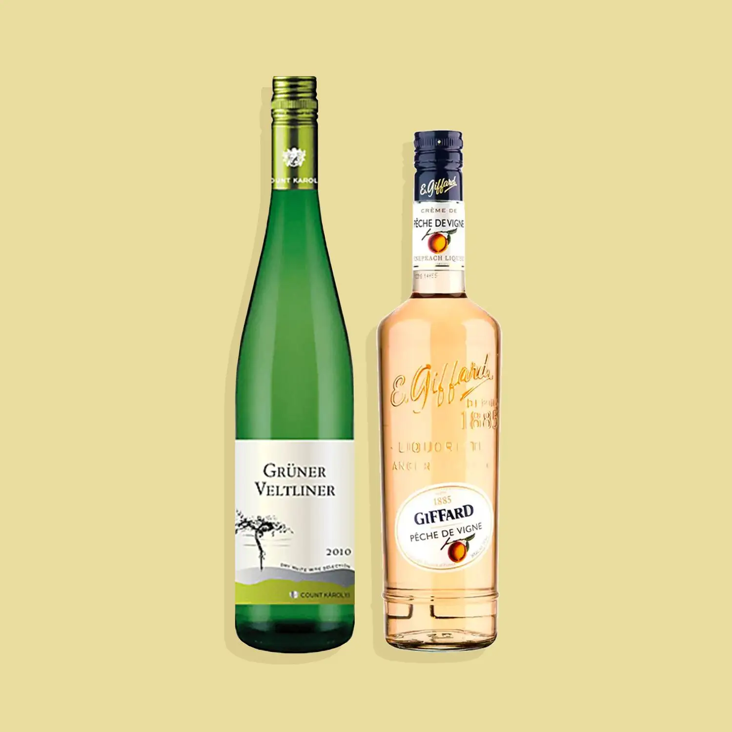 Gruner Veltliner and Giffard peach liqueur bottles against yellow background