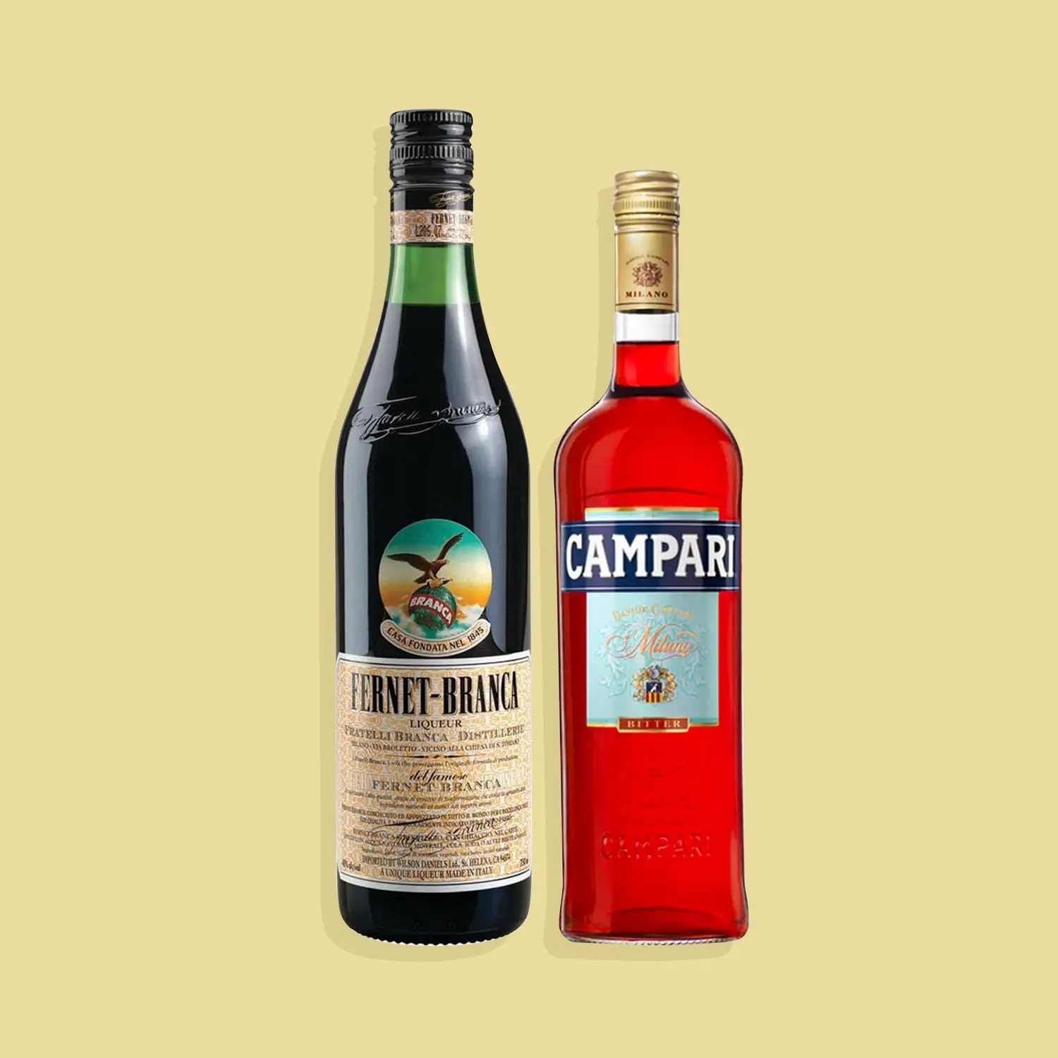 Bottles of Fernet-Branca and Campari against yellow background