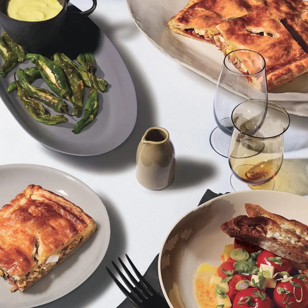 Image may contain Cutlery Fork Food Dish Meal Plant and Pizza