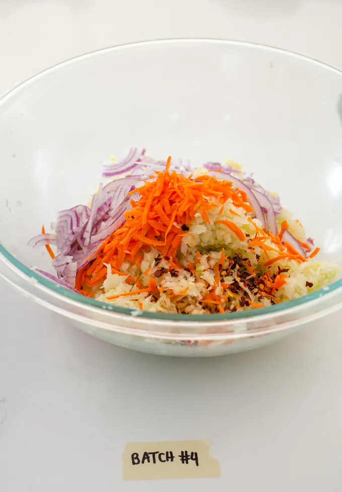 Kraut chi made with red pepper flakes carrots garlic ginger and red onion.' title='Easy Spicy Sauerkraut Recipe