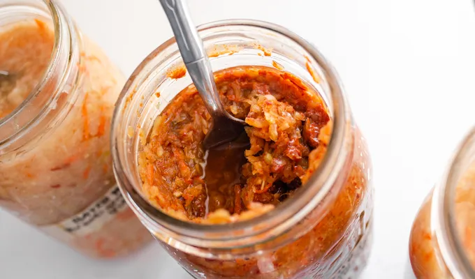 A jar of kraut-chi made with gochugaru.' title='Easy Spicy Sauerkraut Recipe