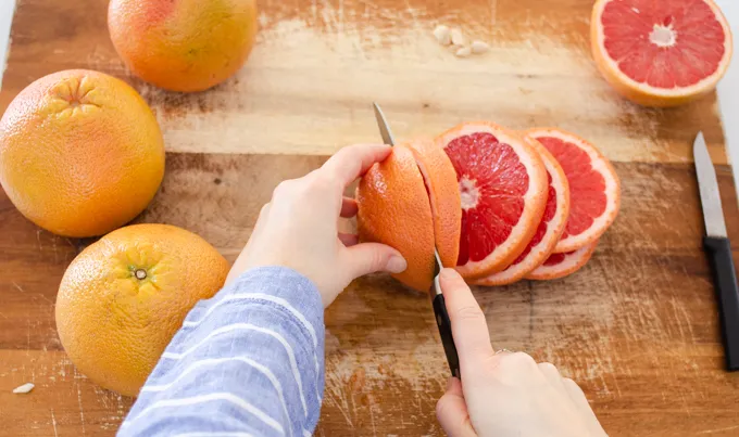 How to cut a grapefruit into a rising sun shape.' title='How to Cut a Grapefruit