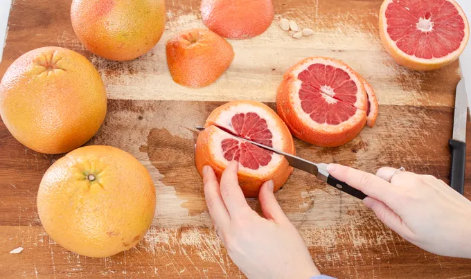 How to cut a grapefruit into a rising sun shape.' title='How to Cut a Grapefruit