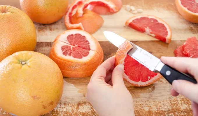 How to cut a grapefruit into a rising sun shape.' title='How to Cut a Grapefruit
