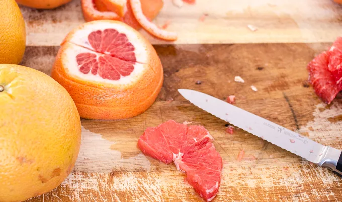 How to cut a grapefruit into a rising sun shape.' title='How to Cut a Grapefruit