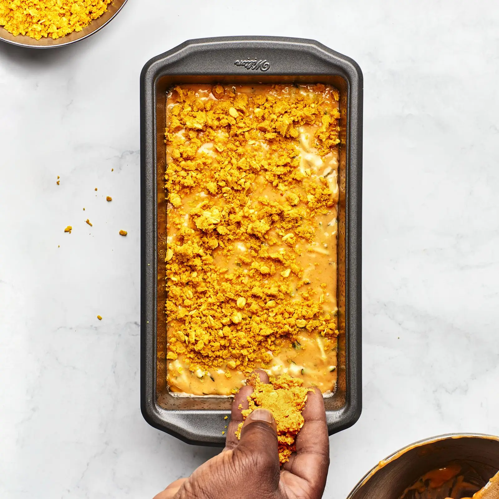 oat streusel topping sprinkled over zucchini bread