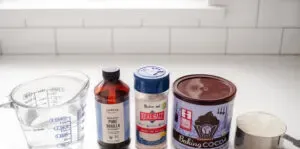 All of the ingredients needed to make chocolate syrup for coffee.' title='Chocolate Syrup for Coffee Recipe