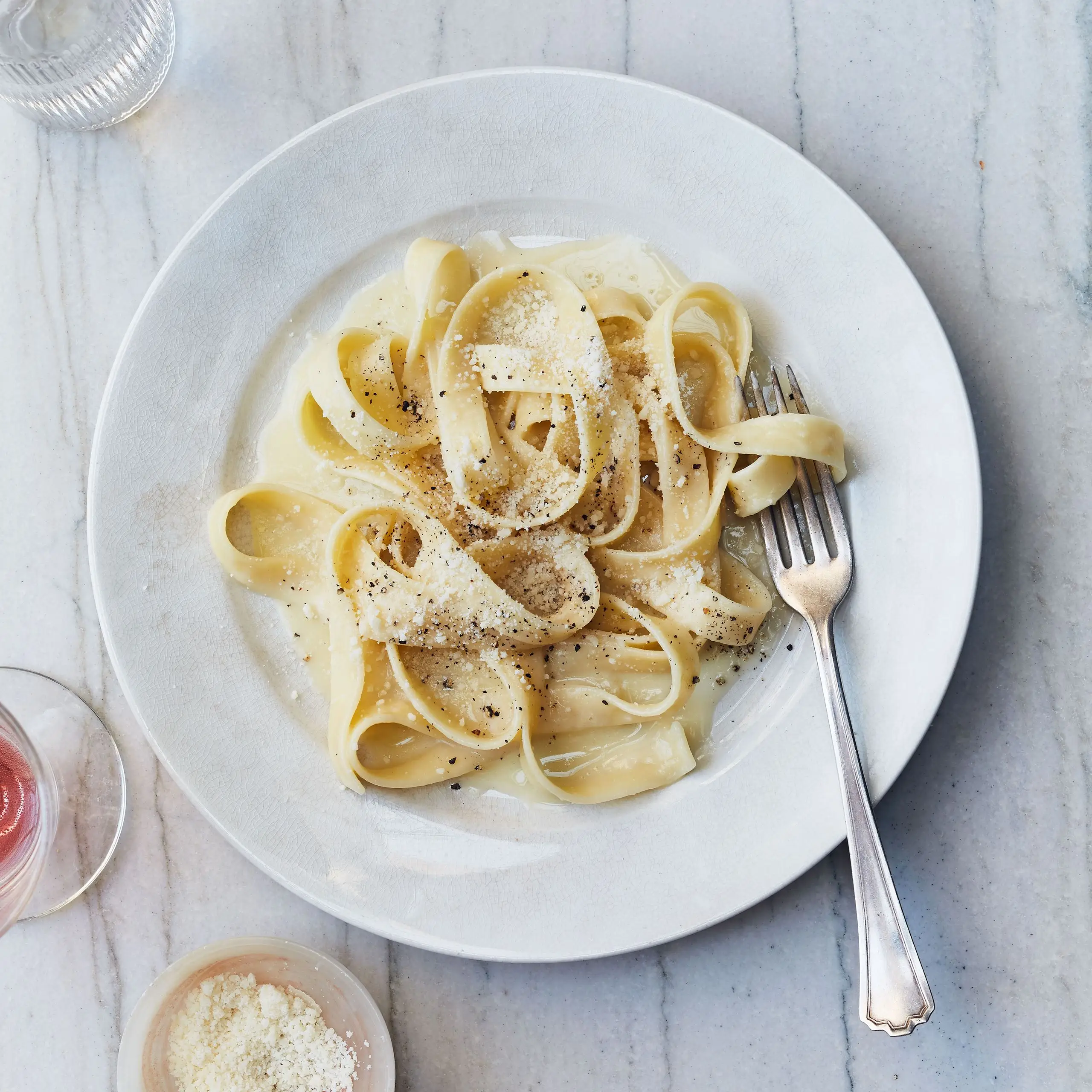 plate of fettuccine alfredo with a fork
