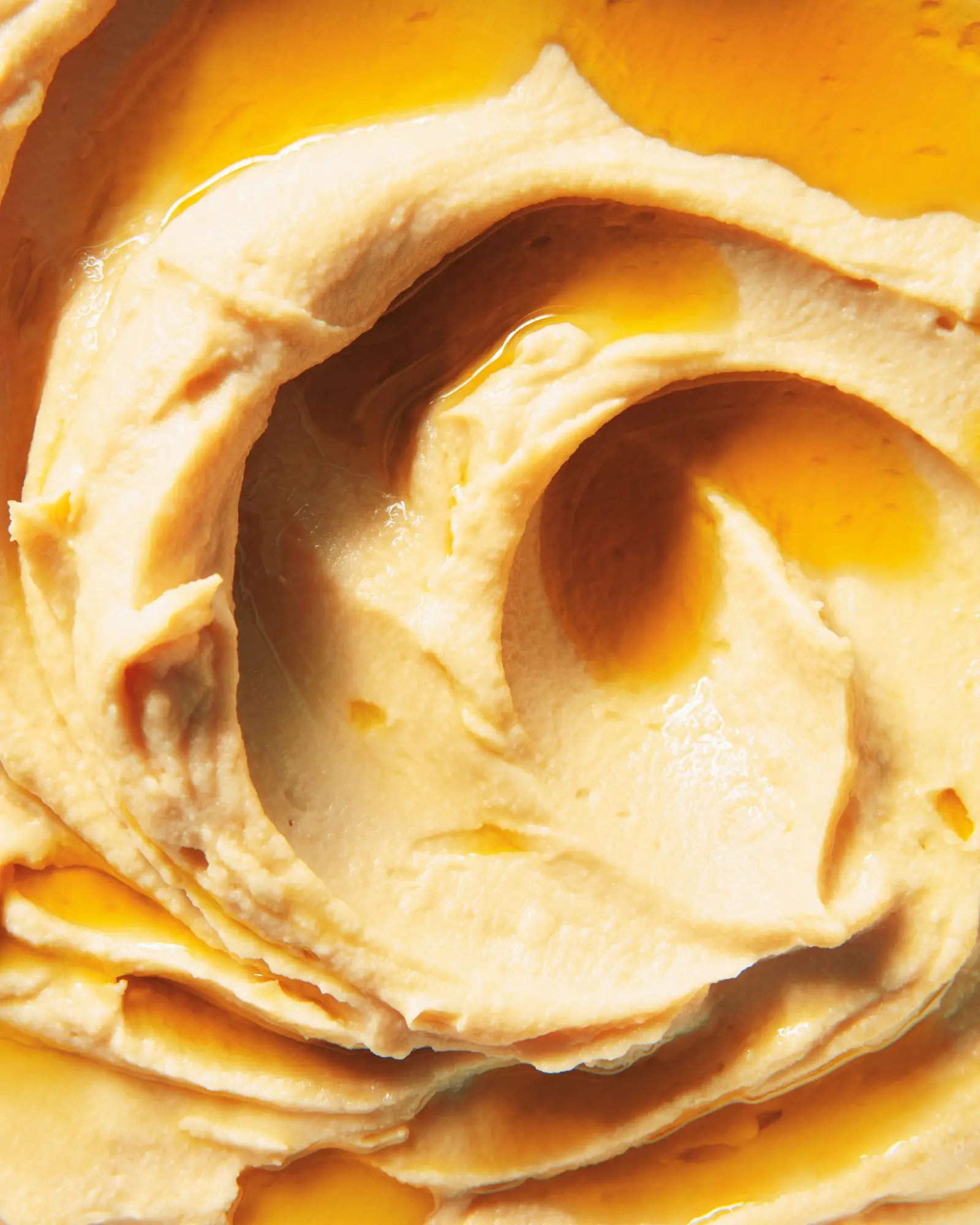 Hummus drizzled with olive oil.
