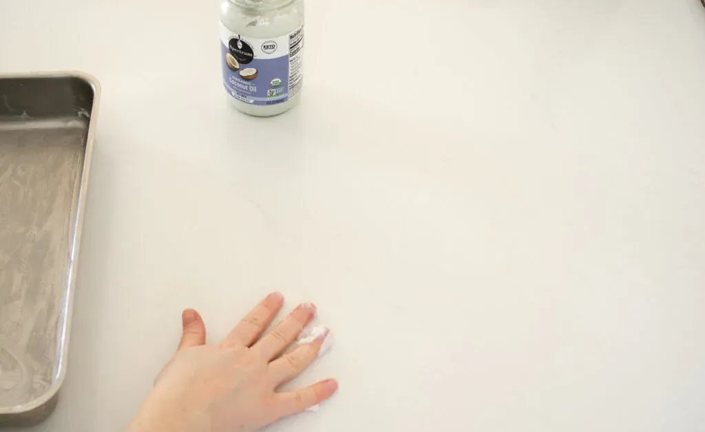 Greasing a counter with coconut oil. ' title='Cinnamon Roll Recipe Without Milk