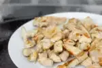 removing the cooked chicken to a plate.' title='Healthy Chicken Stir Fry Recipe