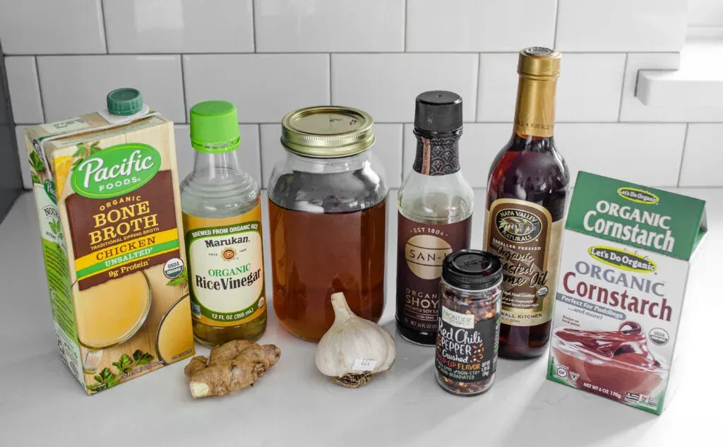 All of the ingredients needed to make a stir-fry sauce: chicken broth rice vinegar maple syrup soy sauce toasted sesame oil cornstarch red pepper flakes garlic and ginger. ' title='Healthy Chicken Stir Fry Recipe