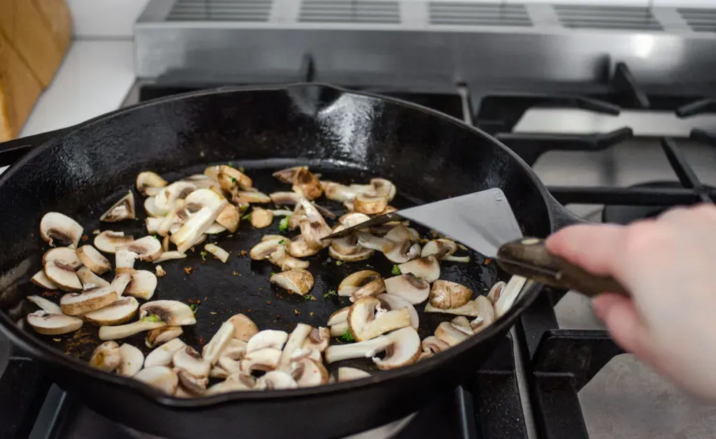 Adding the mushrooms to the pan to stir fry. ' title='Healthy Chicken Stir Fry Recipe