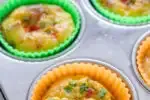 Baked egg muffin cups in the pan.' title='Egg Muffin Cups with Cottage Cheese Bacon and Peppers