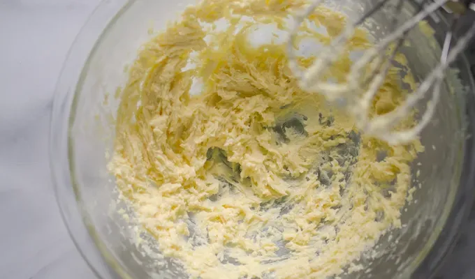 Butter and sugar creamed together in a bowl.' title='Sourdough Banana Bread