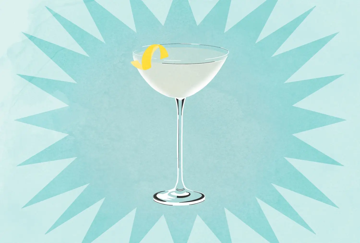 Dry martini in coupe glass with lemon twist against blue background