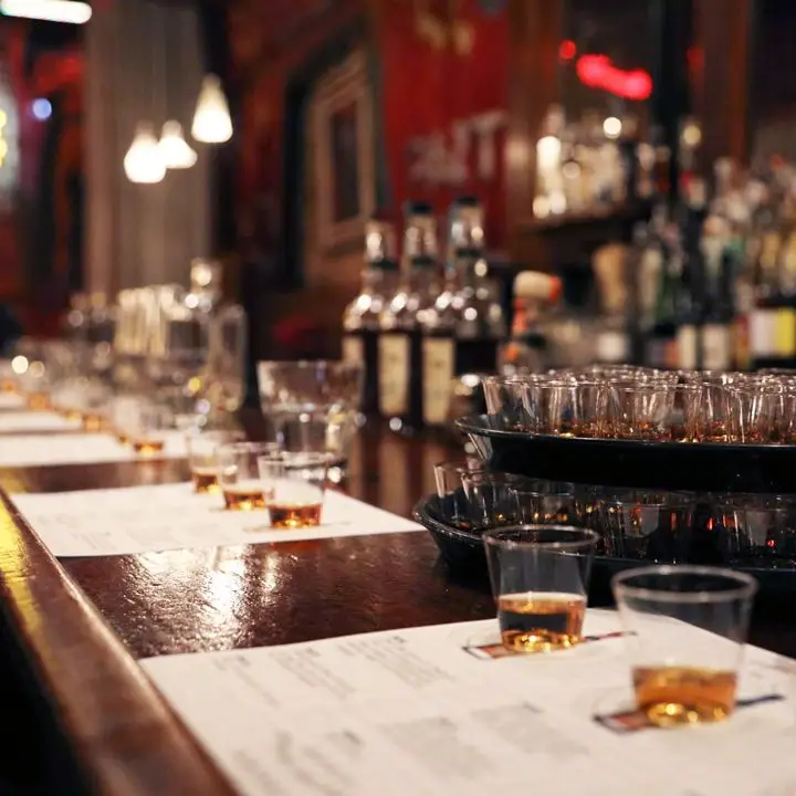 View of a tasting setup at a bar with glasses of whiskey.