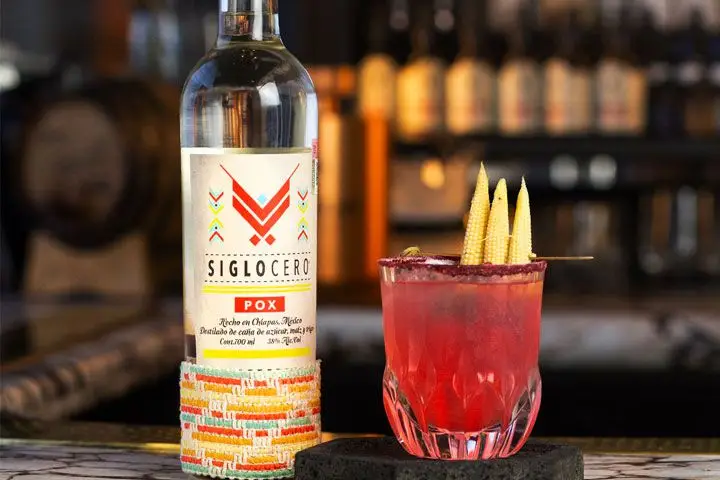 Silgo Cero bottle and red cocktail at Fifty Mils