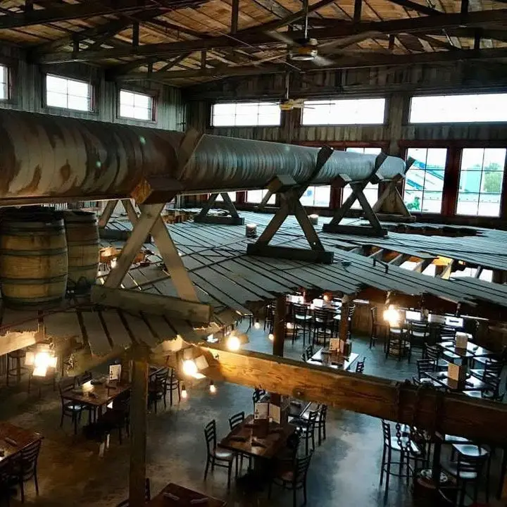 Strap Tank Utah, looking down onto the seating area of a huge barn-ish building