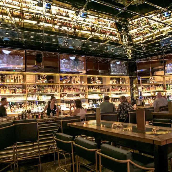 The Dorsey at The Venetian interior with a reflective glass-tile ceiling