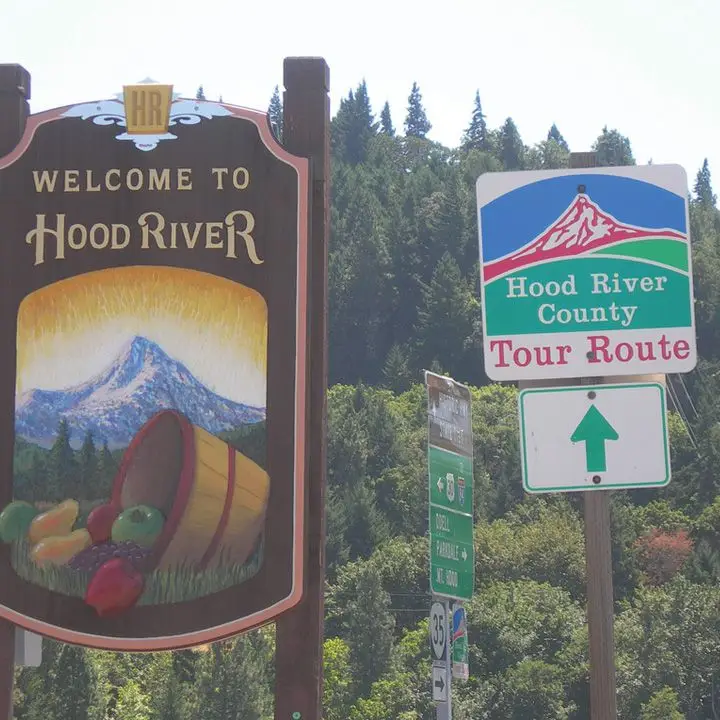 hood river signs including a welcome sign and a Tour Route sign