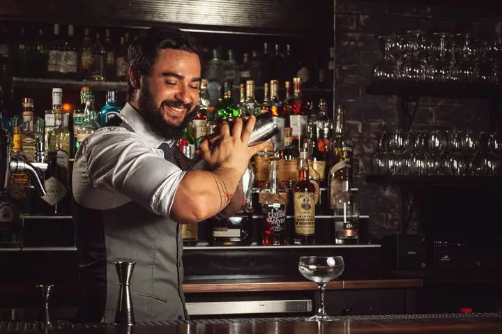 Brendan Bartley shakes a cocktail at Bathtub Gin in NYC.